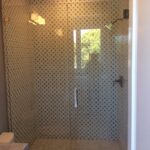 patterned shower tile with custom glass