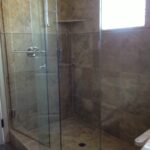 custom shower door installation with tile